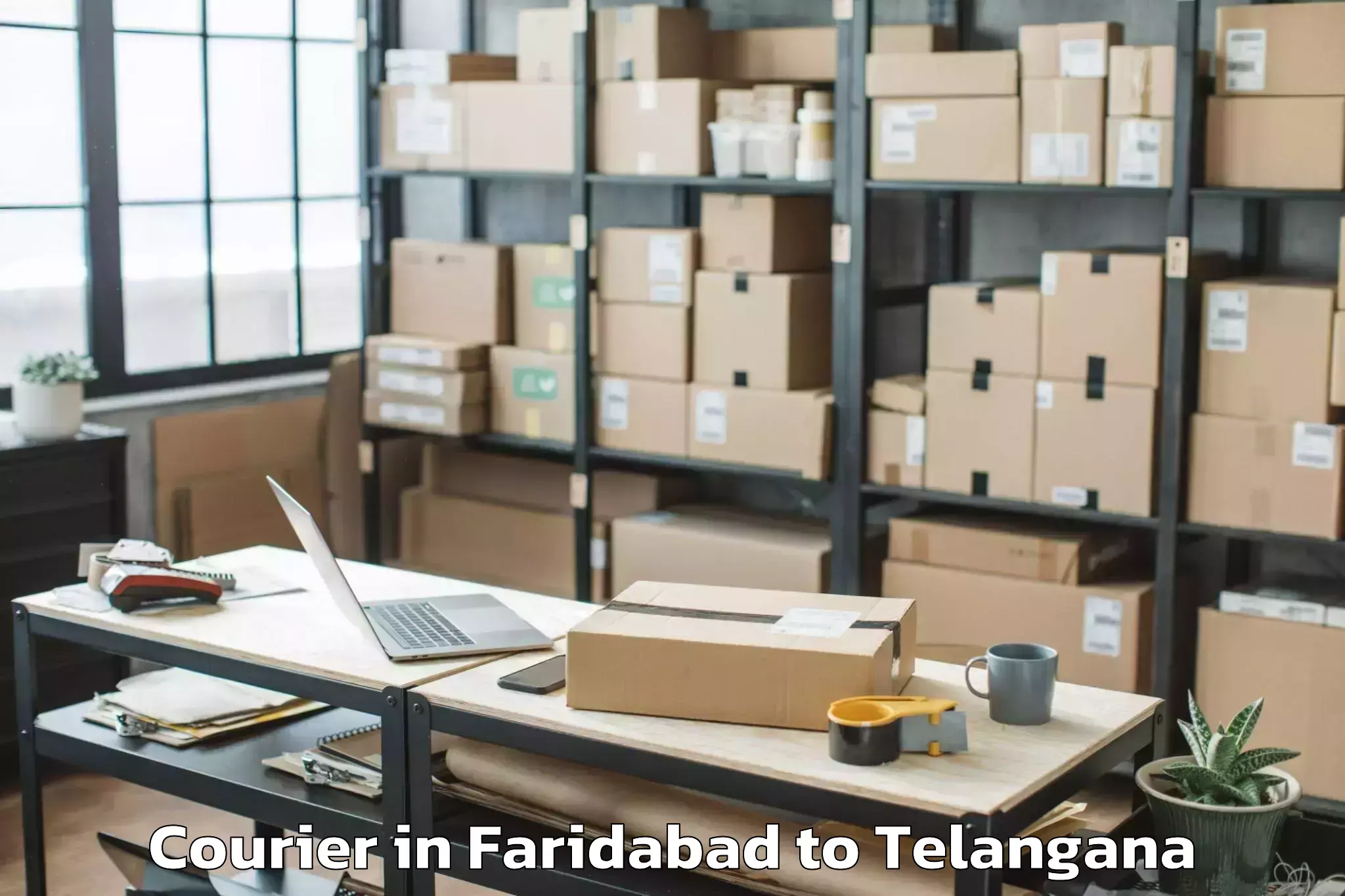 Reliable Faridabad to Manthani Courier